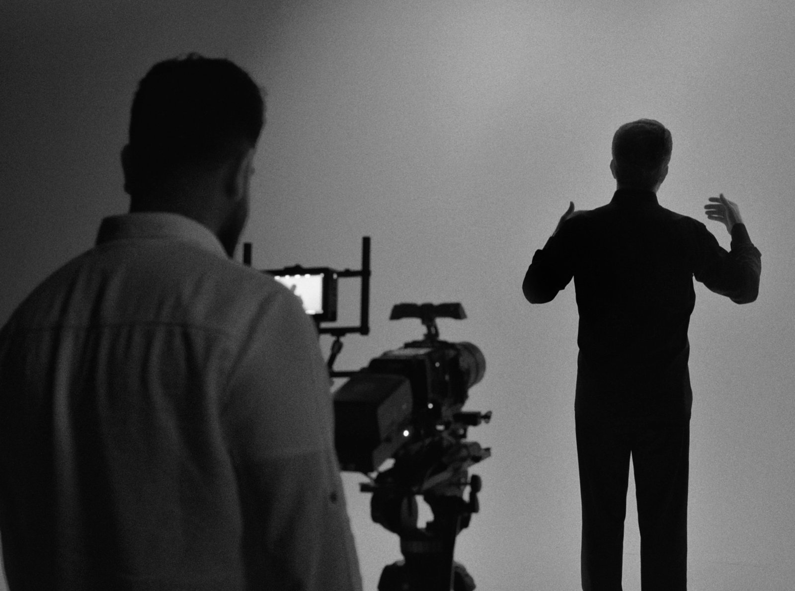 Aiman Alwaeli directing a monochrome studio production